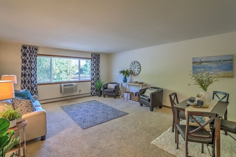 a living room with a couch and a table